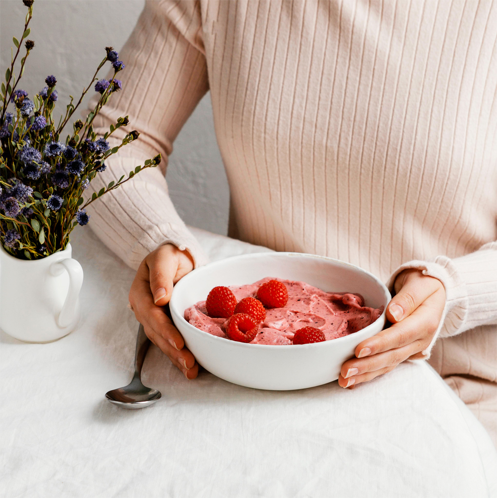 high angle tasty breakfast with raspberry.