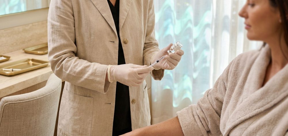 A Menovivre doctor discussing a personalized peptide therapy plan with a patient.